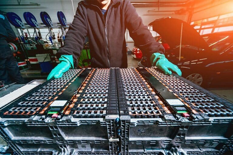 Many car batteries in a workshop